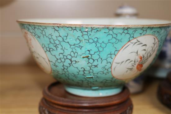 A group of Chinese porcelain and wood stands (10)